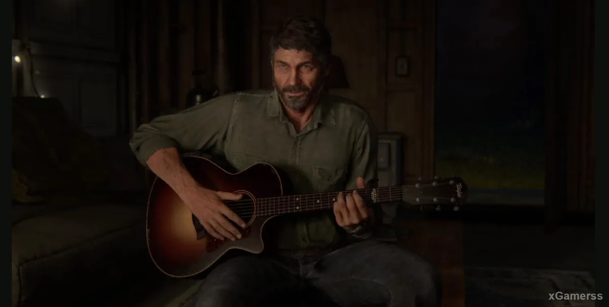 Joel jouant de la guitare